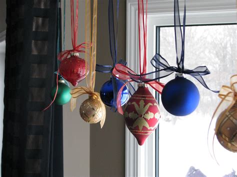 Hang Christmas Ornaments With Color Coordinated Ribbon