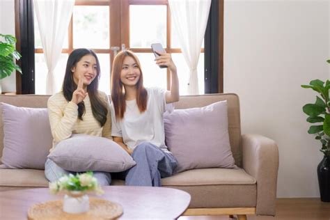 Premium Photo Relax At Home Concept LGBT Lesbian Couple Using