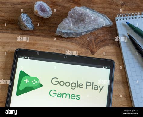 In this photo illustration Google Play Games logo seen displayed on a ...