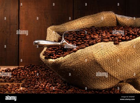 Coffee Beans In Burlap Sack Stock Photo Alamy