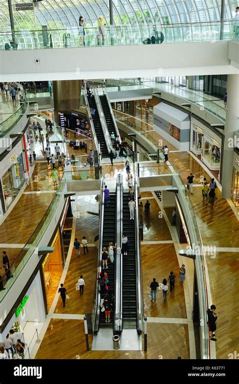 Singapore - Jun 13, 2017. Marina Bay Shopping Mall with shoppers in ...