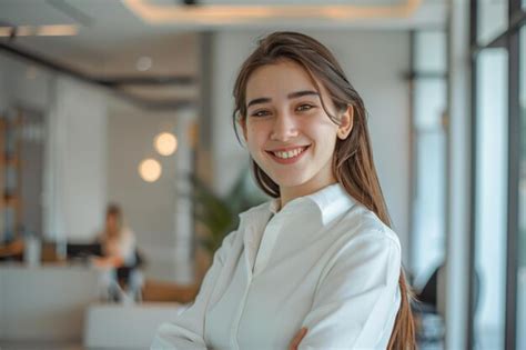 A Girl With Long Hair Wearing A White Shirt And A White Shirt Premium Ai Generated Image