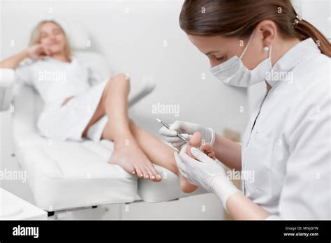 Podiatrist Doctor Stock Photos & Podiatrist Doctor Stock Images - Alamy