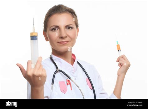 Blonde Nurse Holding Syringe Hi Res Stock Photography And Images Alamy