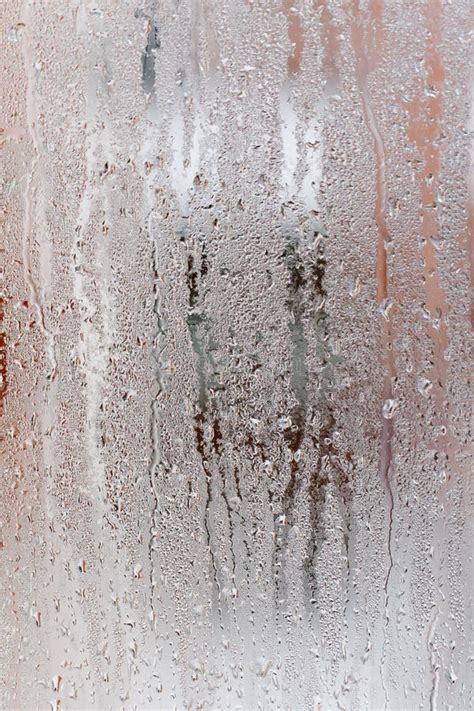 Background Of Natural Water Condensation Window Glass With High Air