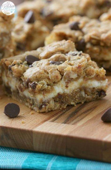Peanut Butter Chocolate Chip Cheesecake Bars - A Kitchen Addiction