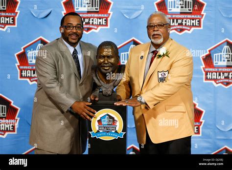 Curley Culp R And Son Chad Pose At The Nfl Class Of 2013 Enshrinement