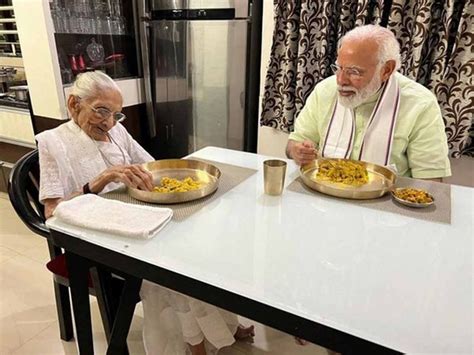 Photos Indias Pm Narendra Modi Meets Mother Heeraben Modi On Her