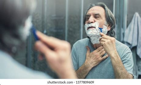 Mature Man Shaving Front Mirror Stock Photo 1377809609 Shutterstock