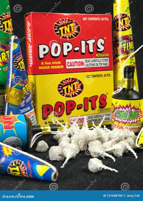 Low Grade Hand Held Fireworks Like Pop Its And Party Poppers On A Black