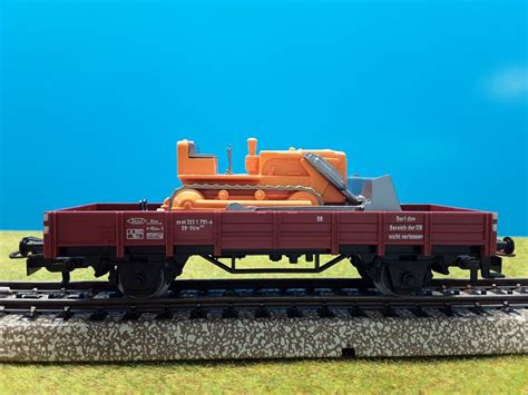 Märklin 4424 Niederbordwagen mit Bagger Spur H0 Kaufen auf Ricardo