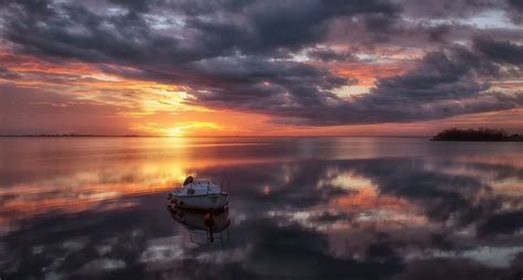 White boat on body of water under grey and yellow sky wallpaper, boat, sunlight, nature, water ...