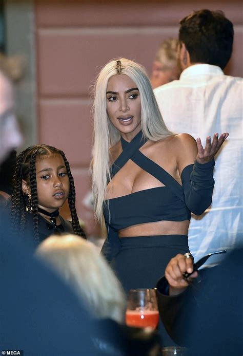 Kim Kardashian Flaunts Her Curves In A Very Busty Grey Crop Top At