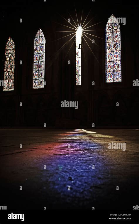 Stained Glass Windows In Lincoln Cathedral Casting Colours Onto The