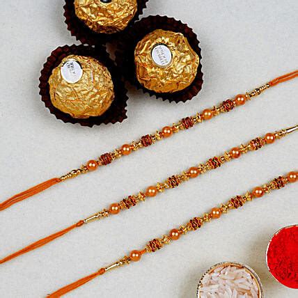 Golden Red Thread Rakhi With Pcs Ferrero Rocher Singapore Gift