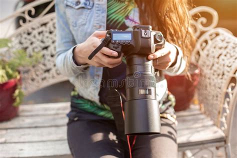 Close Up Of Professional Female Photographer On The Street