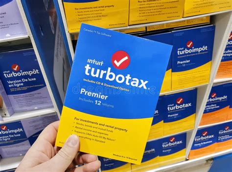 Turbotax Premier Software On Cd And License Box In A Hand Editorial