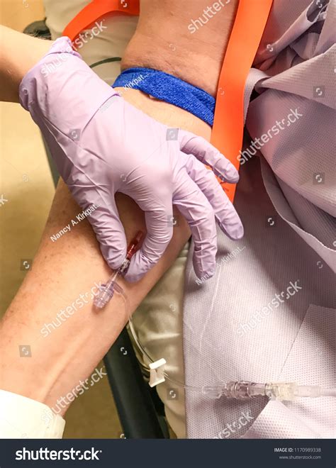 Starting Iv Inserting Iv Catheter Into Stock Photo 1170989338