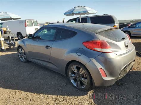 Report KMHTC6AD1GU258390 HYUNDAI VELOSTER 2016 SILVER GAS Price And