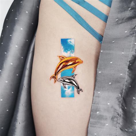 Delve Into The Beauty Of Dolphin Tattoos Explore 40 Mesmerizing