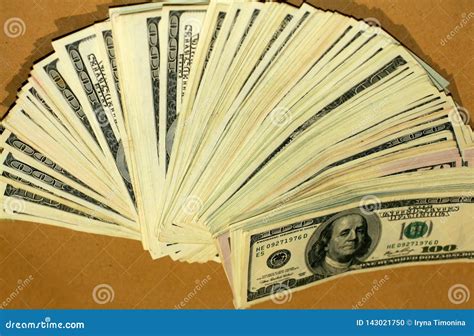 Money Dollars Spread Out On The Table Like A Fan Stock Photo Image Of