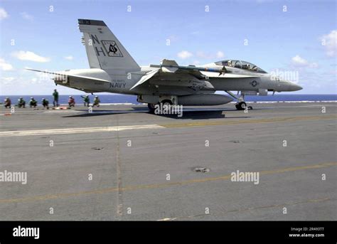 US Navy An F A 18F Super Hornet Prepares To Launch From One Of Four