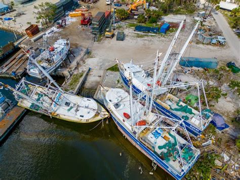 Hurricane Ian Storm Surge Flood Causing Boats To Be Lifted On Top Of Docks And Stuck After Water