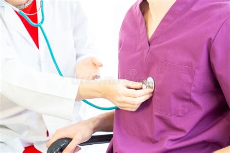 Male Patients Come To See A Female Doctor To Check The Illness Or