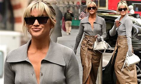 Ashley Roberts Cuts A Stylish Figure In A Snakeskin Look Leather Skirt