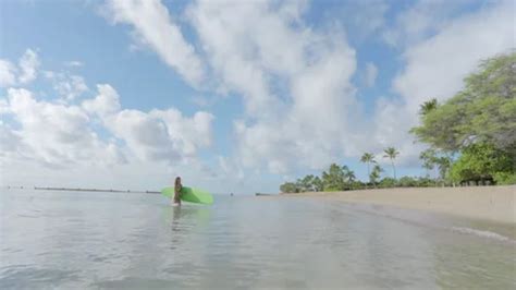 Female Surfer In Bikini Coming Out Of Th Stock Video Pond