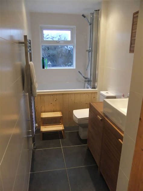 The Calyx Shown With Removable Step And Overhead Shower Deep Soaking