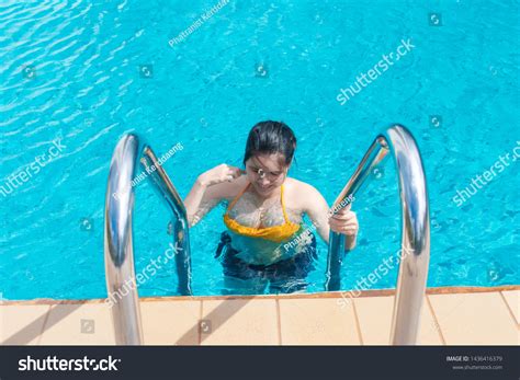 Asian Woman Holding Handrails Swimming Pool Stock Photo 1436416379