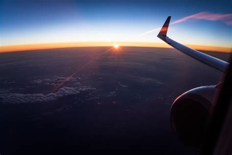 Fotos Gratis Horizonte Ala Nube Cielo Amanecer Puesta De Sol