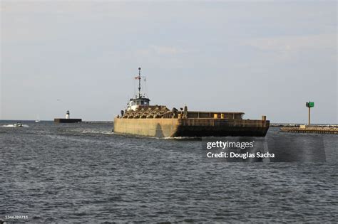 Tugboat Pushing A Working Barge High Res Stock Photo Getty Images