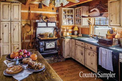 Check out this rustic log cabin kitchen, from the article "Into the Woods." Photographed by Bill ...