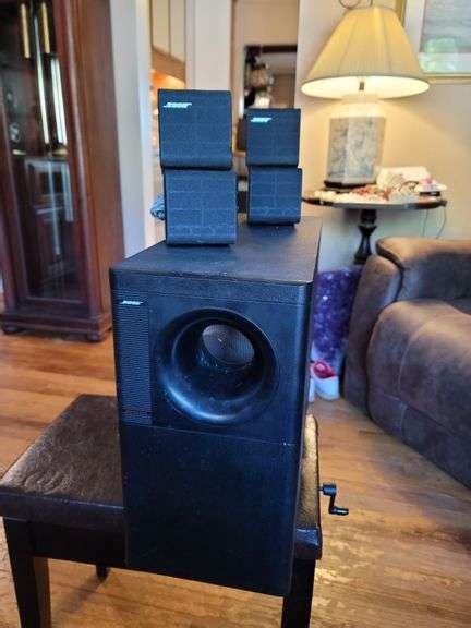 Bose Surround sound speakers - Auction Solutions Inc