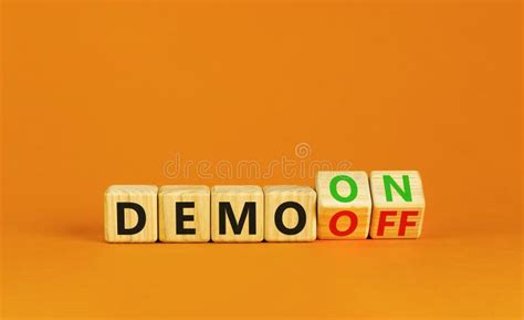 Demo On Or Off Symbol Businessman Turns Wooden Cubes And Changes Word