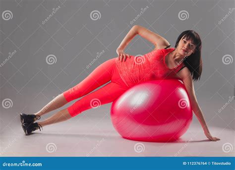 Cute Brunette Woman Doing Exercises With Fitball Stock Photo Image Of Balance Recreation