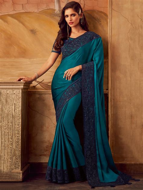 Teal Blue Silk Plain Saree With Floral Embroidered Border In 2020