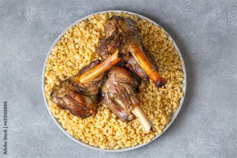 Turkish Foods Lamb Shank Tandoori On Bulgur Wheat Rice Turkish Name Bulgur Bugday Pilavi Kuzu