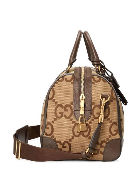 Gucci Jumbo Gg Duffle Bag In Brown Modesens