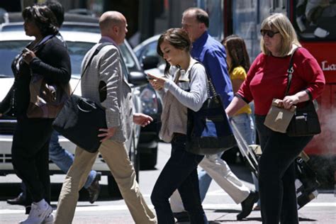 Distracted Walking Smartphone Wielding Pedestrians Stumble Into Danger