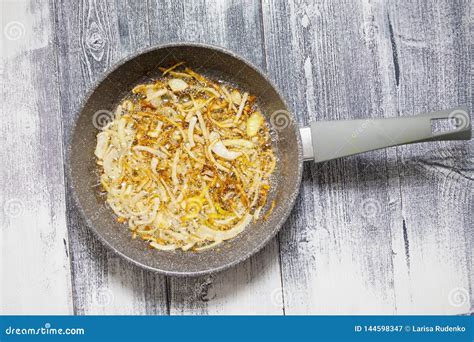 Fried Onions In A Pan Cooking Onions In A Pan Beautiful Wooden