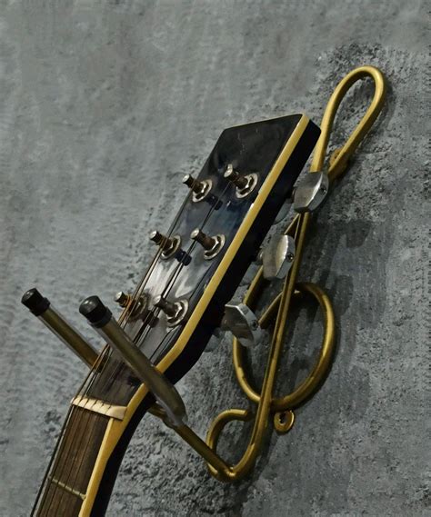 Suporte de Parede Para Violão e Guitarra Clave de Sol Elo7