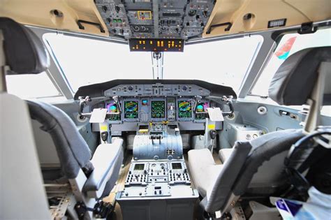 Cockpit of Bombardier Q400 Nextgen Turboprop Plane at Singapore Airshow Editorial Image - Image ...