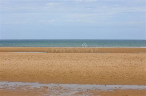 Golden Beach By The Sea And Puddles After High Tide Stock Photo Image