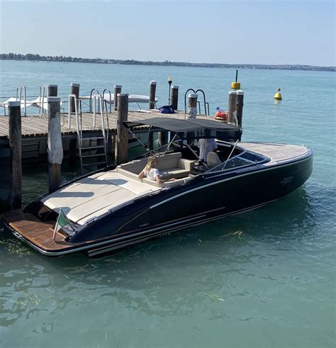 Aboard A Classic Retro Style Runabout Boat In The Heart Of Italy