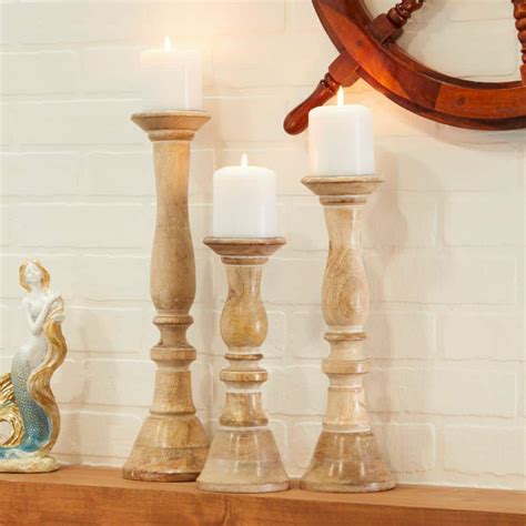 Reviews For Litton Lane Light Brown Carved Wood Candle Holder Metal