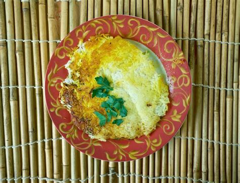 Premium Photo Chelo Rice Persian Steamed White Rice With A Golden Crust