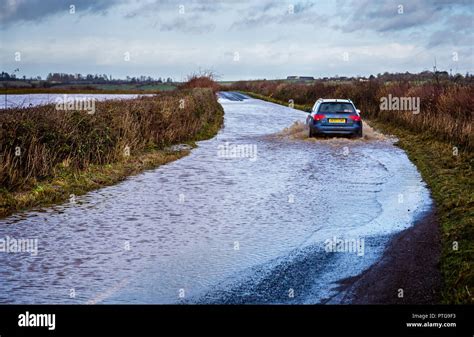 Car Driving Through Floodwater Hi Res Stock Photography And Images Alamy